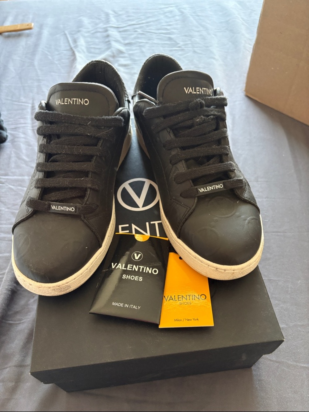 Valentino Black Low-Top Sneakers with White Soles and Logo Detail